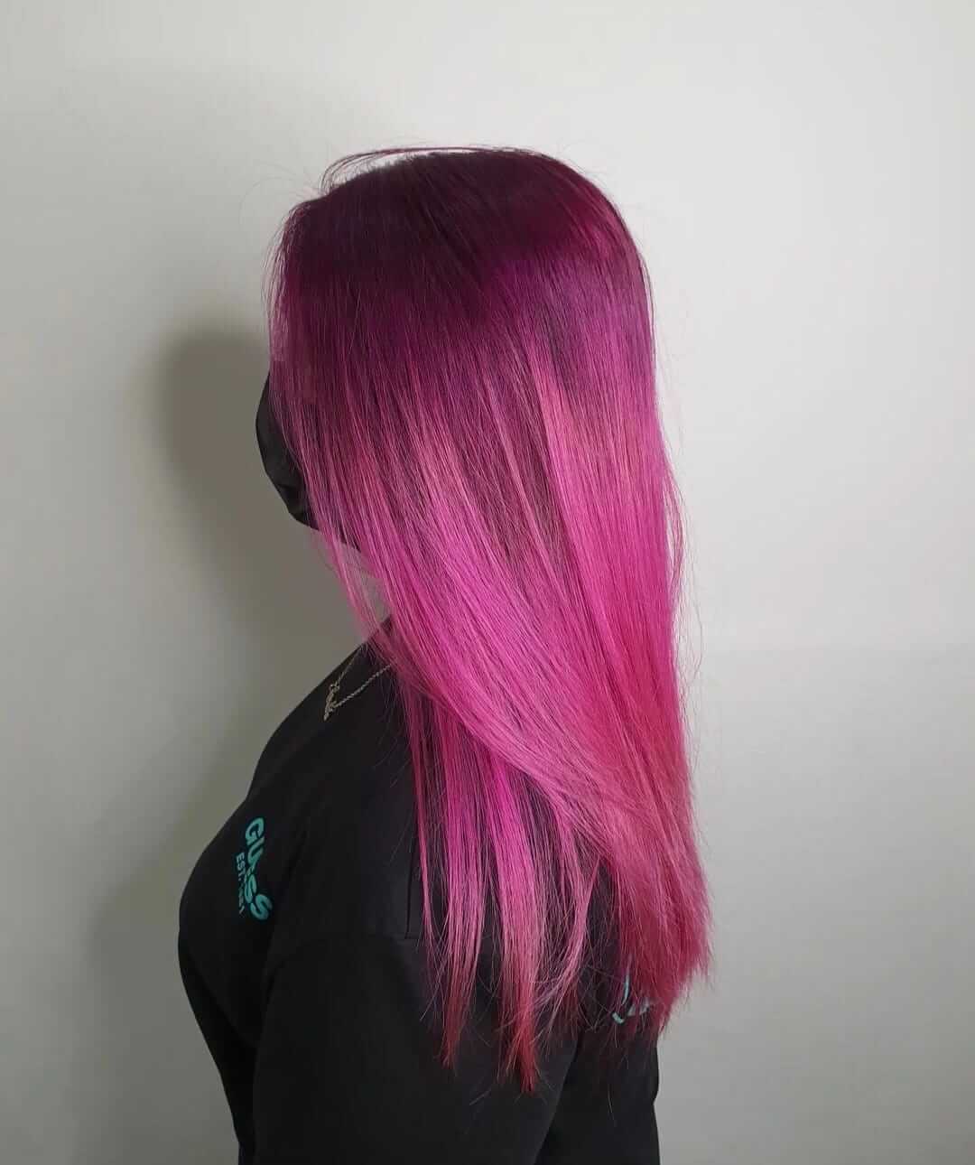 Long pink and purple ombre hair styled at Stage Hair Studio